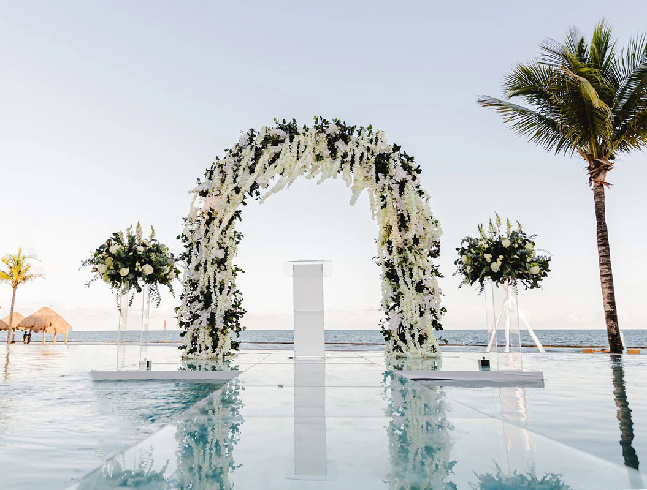 Over the water wedding venue at Breathless Riviera Cancun resort.