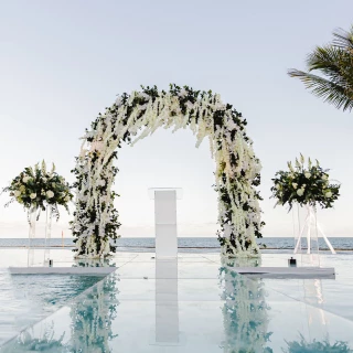 Over the water wedding venue at Breathless Riviera Cancun resort.