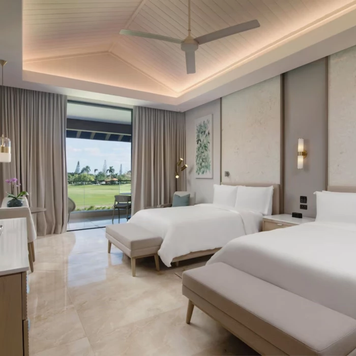 suite with two beds at Casa de Campo