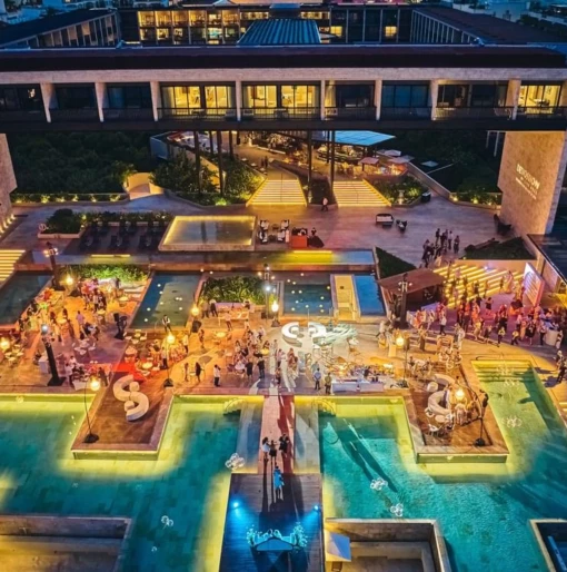 aerial view of Devossion by Live Aqua Playa del Carmen at night