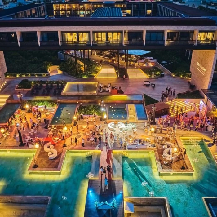 aerial view of Devossion by Live Aqua Playa del Carmen at night