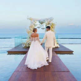bride and groom at the infinity venue at Devossion by Live Aqua Playa del Carmen