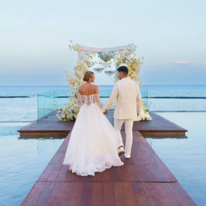 bride and groom at the infinity venue at Devossion by Live Aqua Playa del Carmen