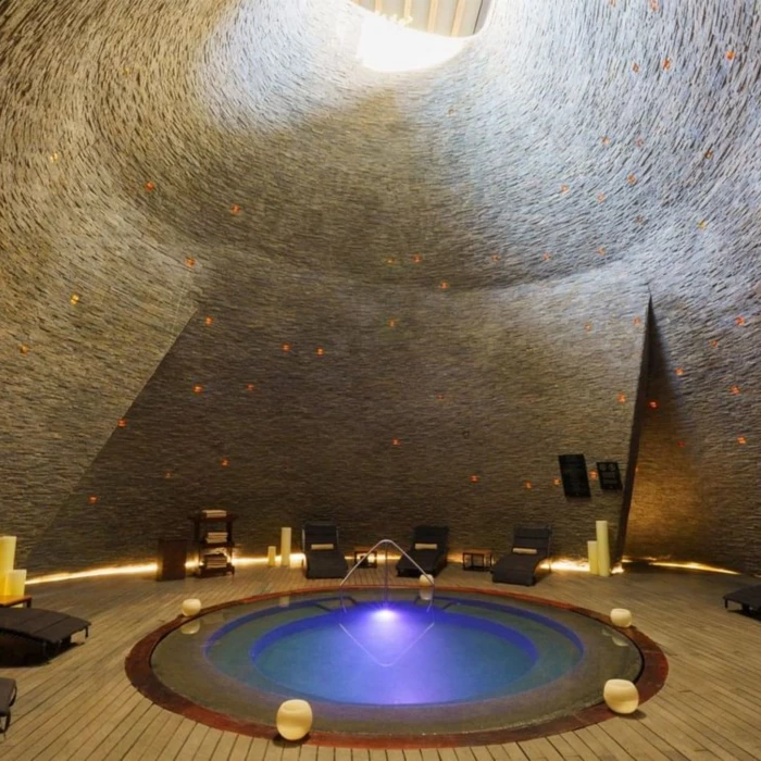 loungers by the spa pool at Devossion by Live Aqua Playa del Carmen