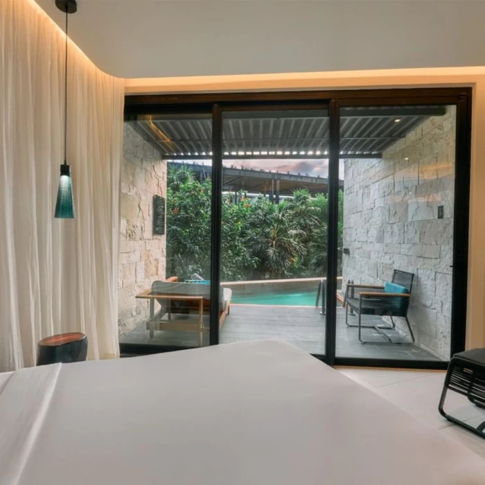 suite with pool at Devossion by Live Aqua Playa del Carmen