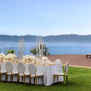 ceremony and reception setup at the beach garden deck venue at dreams and secrets bahia mita