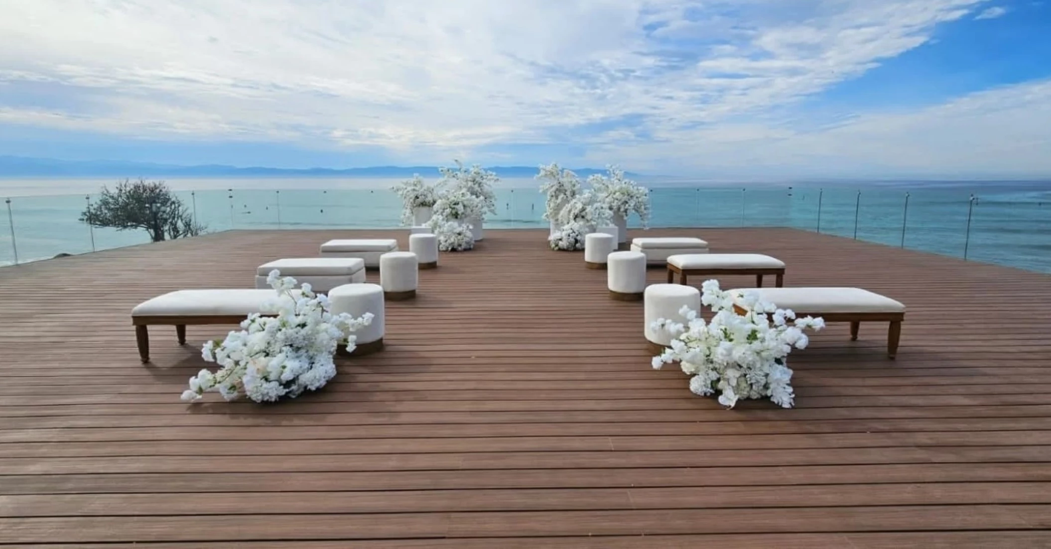 ceremony setup at the wooden deck at the beach garden at dreams and secrets bahia mita