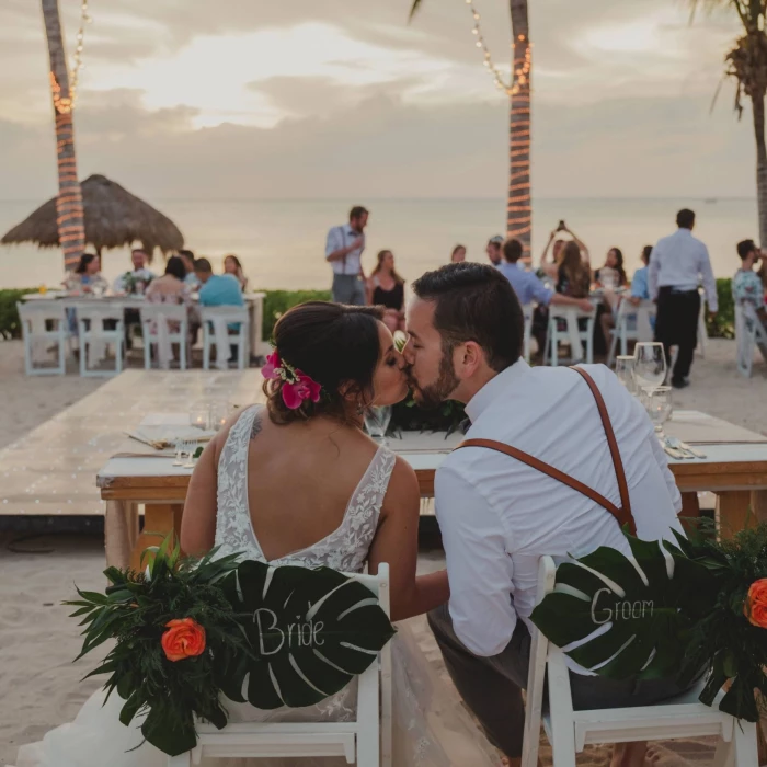 bride and groom at their beach reception at Dreams Cozumel Cape Resort & Spa