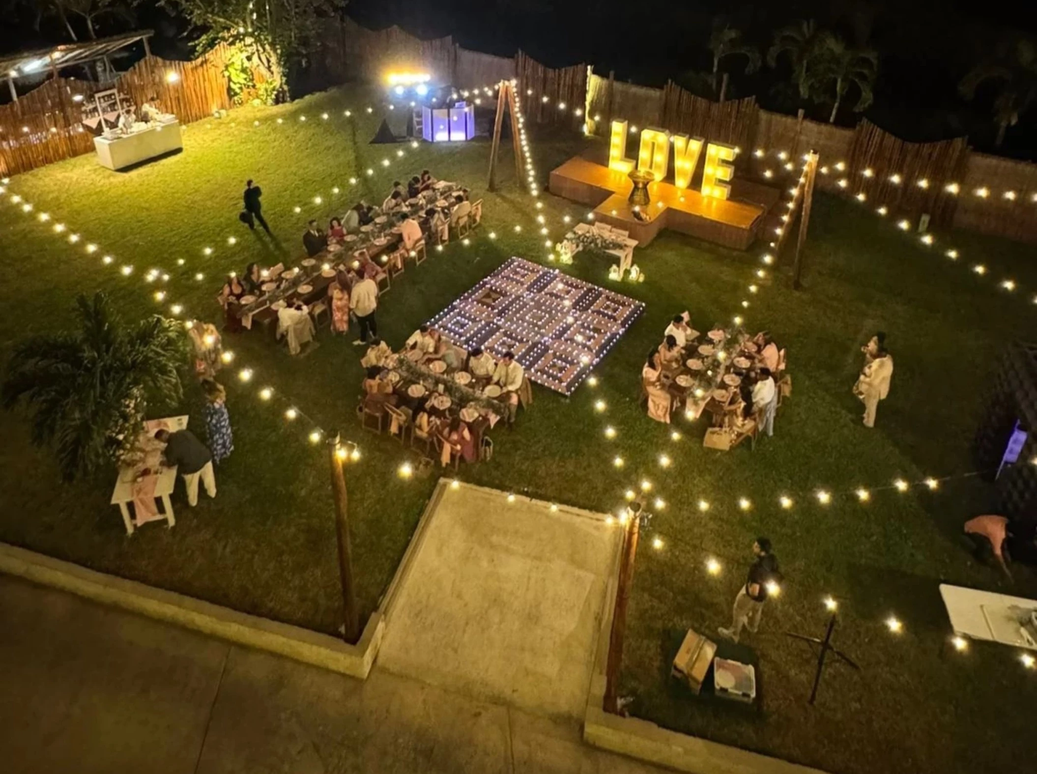 garden venue lit up in the evening at Dreams cozumel cape resort