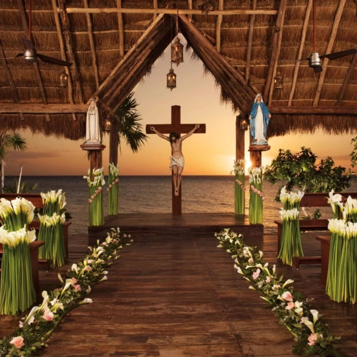 sunset over the chapel at dreams cozumel cape resort