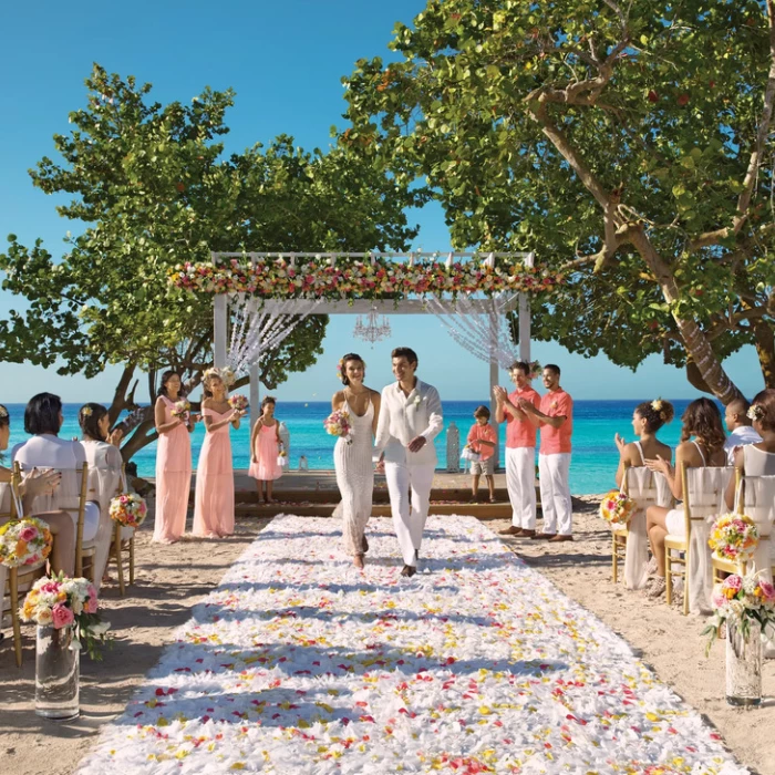 bride groom and guests at the beach gazebo at Dreams Dominicus La Romana