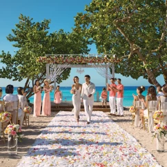 bride groom and guests at the beach gazebo at Dreams Dominicus La Romana