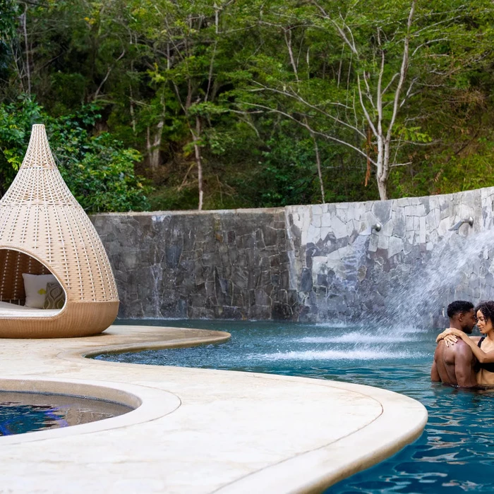 couple at the hydrotherapy circuit at Dreams Las Mareas