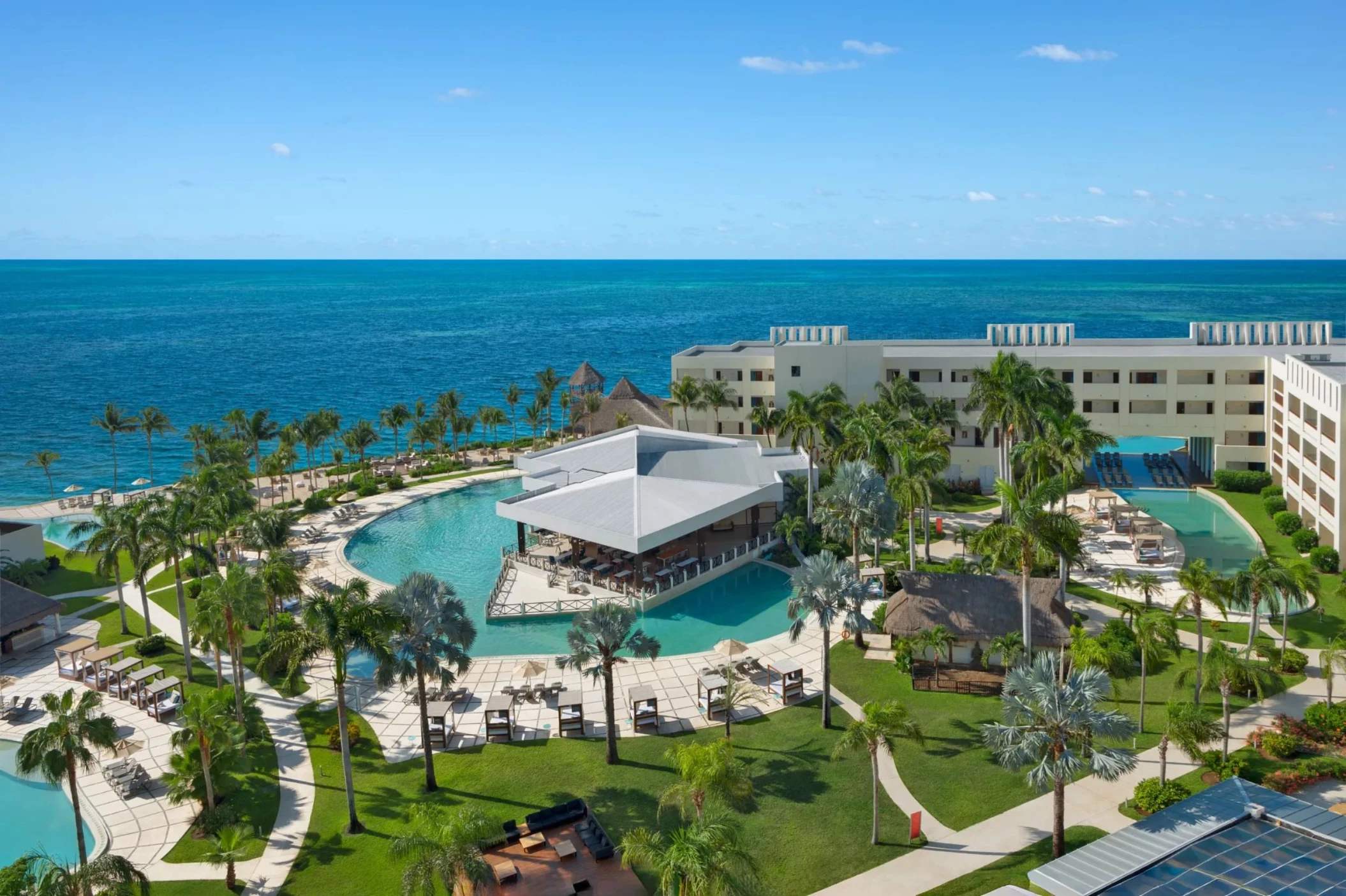 aerial view of dreams puerto morelos with its pools and buildings and beach