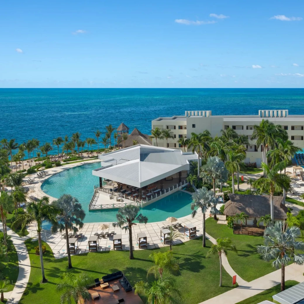 aerial view of dreams puerto morelos with its pools and buildings and beach