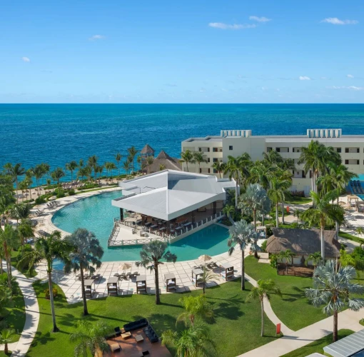 aerial view of dreams puerto morelos with its pools and buildings and beach