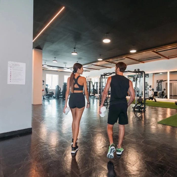 couple at the gym at Dreams Puerto Morelos Resort & Spa