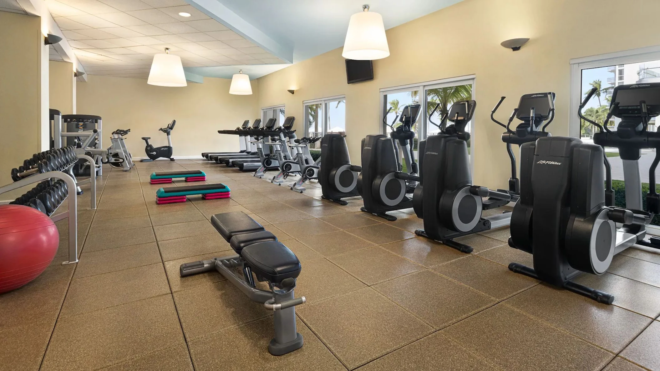 The resort's gym, well-equipped with various cardio and weight-training machines for guests to use.