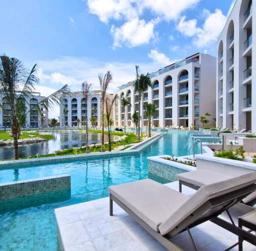 Excellence Coral Playa Mujeres accommodations and pools of swim out suites