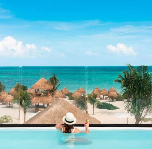 pool overlooking the beach at Excellence Coral Playa Mujeres