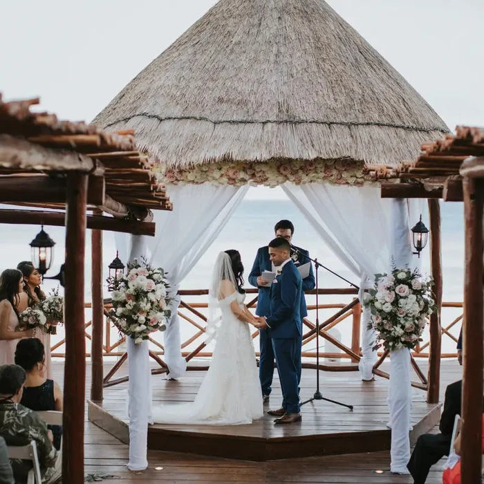 bride groom and guests at the gazebo deck venue at Fiesta Americana Condesa Cancun