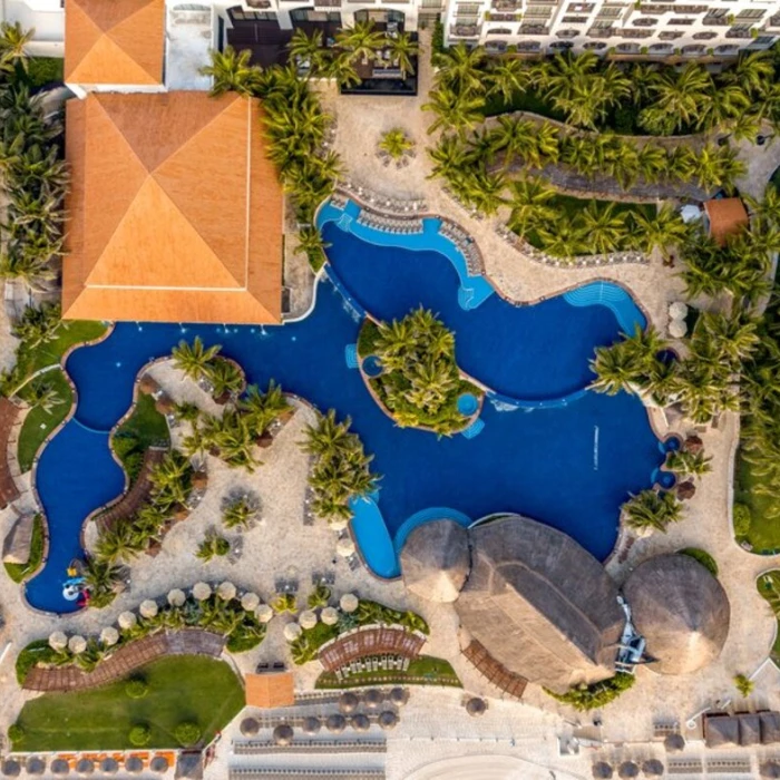 resort buildings and pools at Fiesta Americana Condesa Cancun