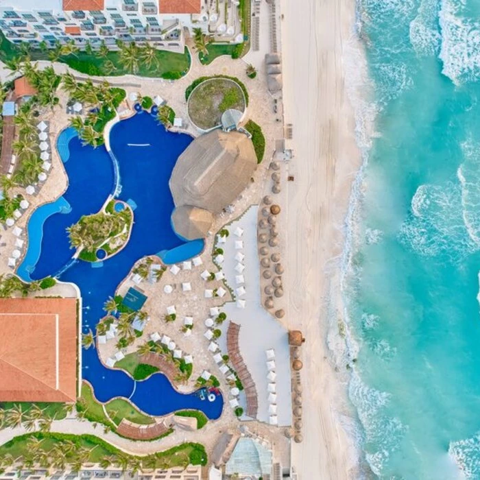 top view of Fiesta Americana Condesa Cancun resort pool and beach