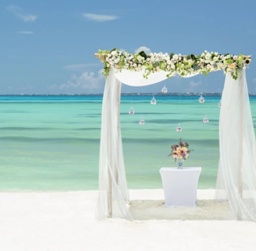 beach wedding setup at Grand Fiesta Americana Coral Beach Cancun