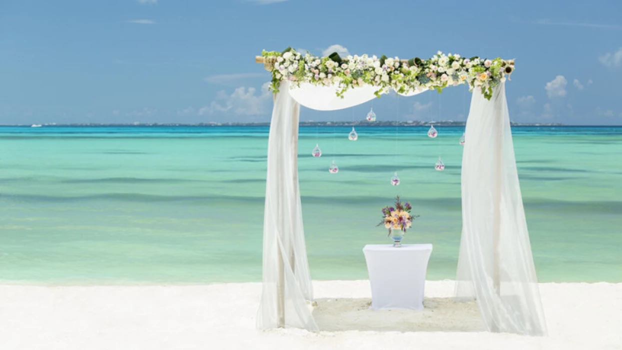 beach wedding setup at Grand Fiesta Americana Coral Beach Cancun