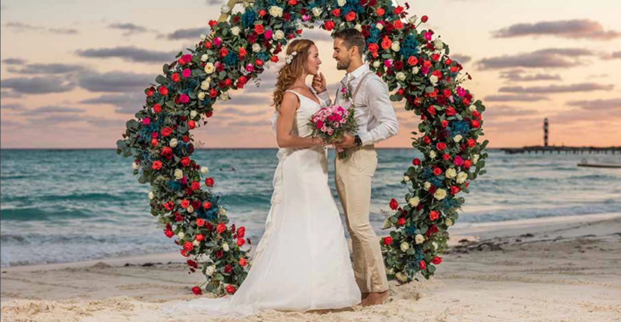 bride and groom on the beach venue at grand fiesta americana coral beach cancun
