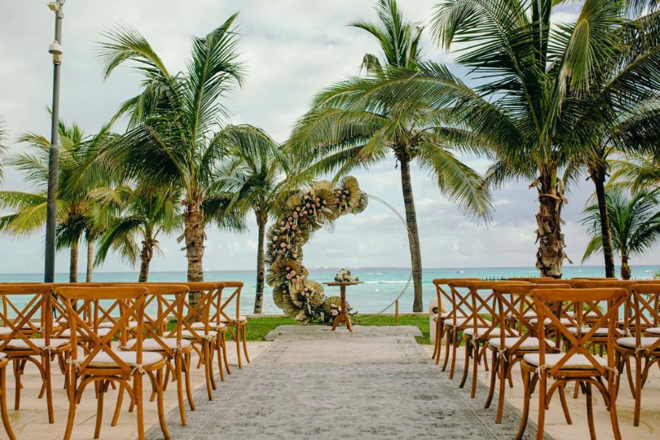 wedding setup at sunrise terrace venue at grand fiesta americana coral beach cancun