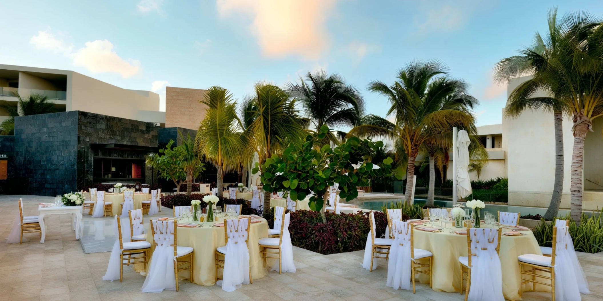 fizz pool terrace venue reception setup with dance floor at Grand Palladium Select Costa Mujeres