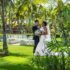 bride and groom at the garden venue at Grand Palladium Punta Cana