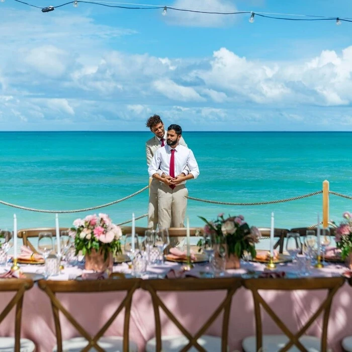 two grooms at the la uva venue at Grand Palladium Punta Cana