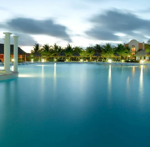the beautiful pool in the evening at grand palladium kantenah resort