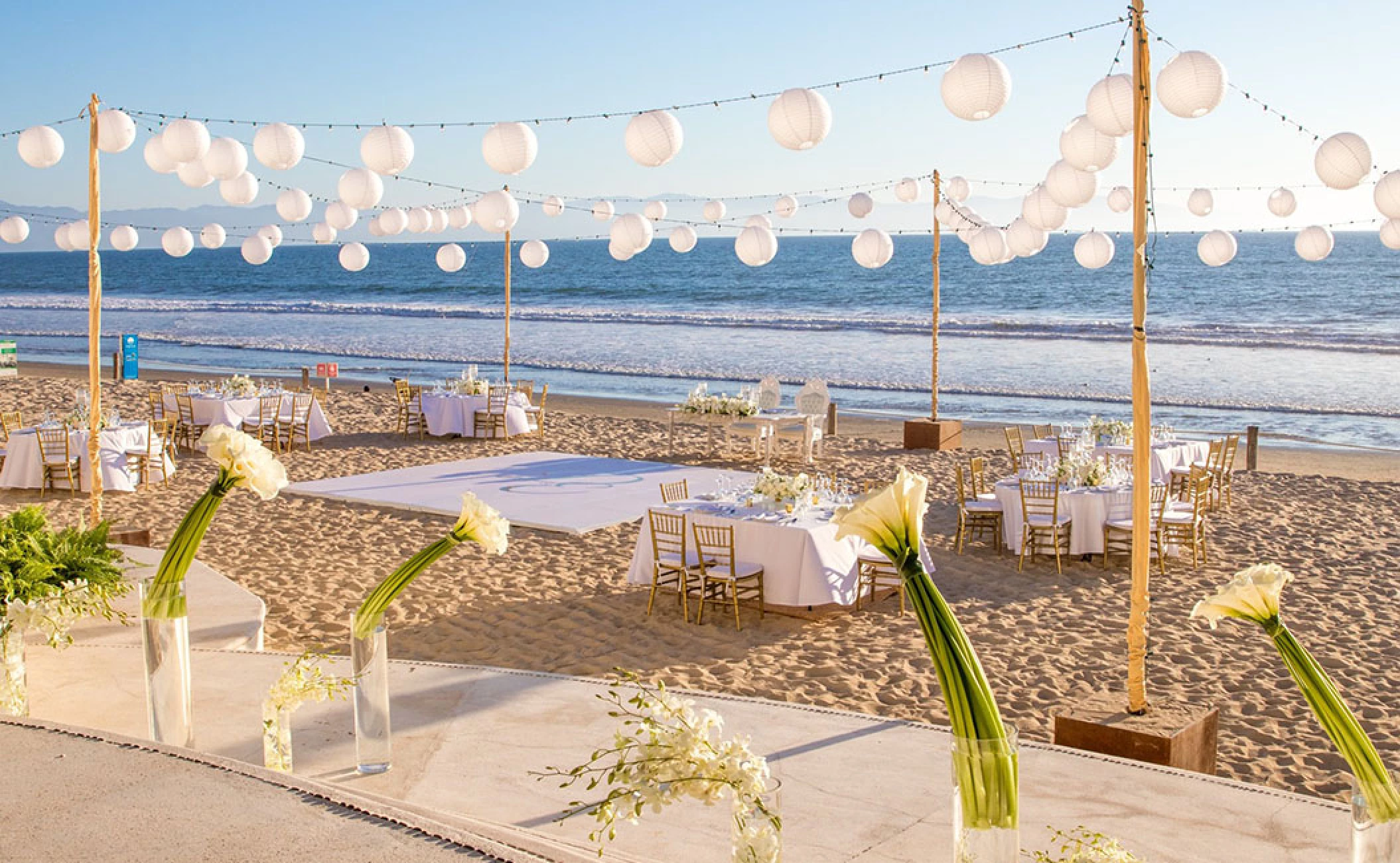 Beach wedding reception setup at Grand Velas Riviera Nayarit.