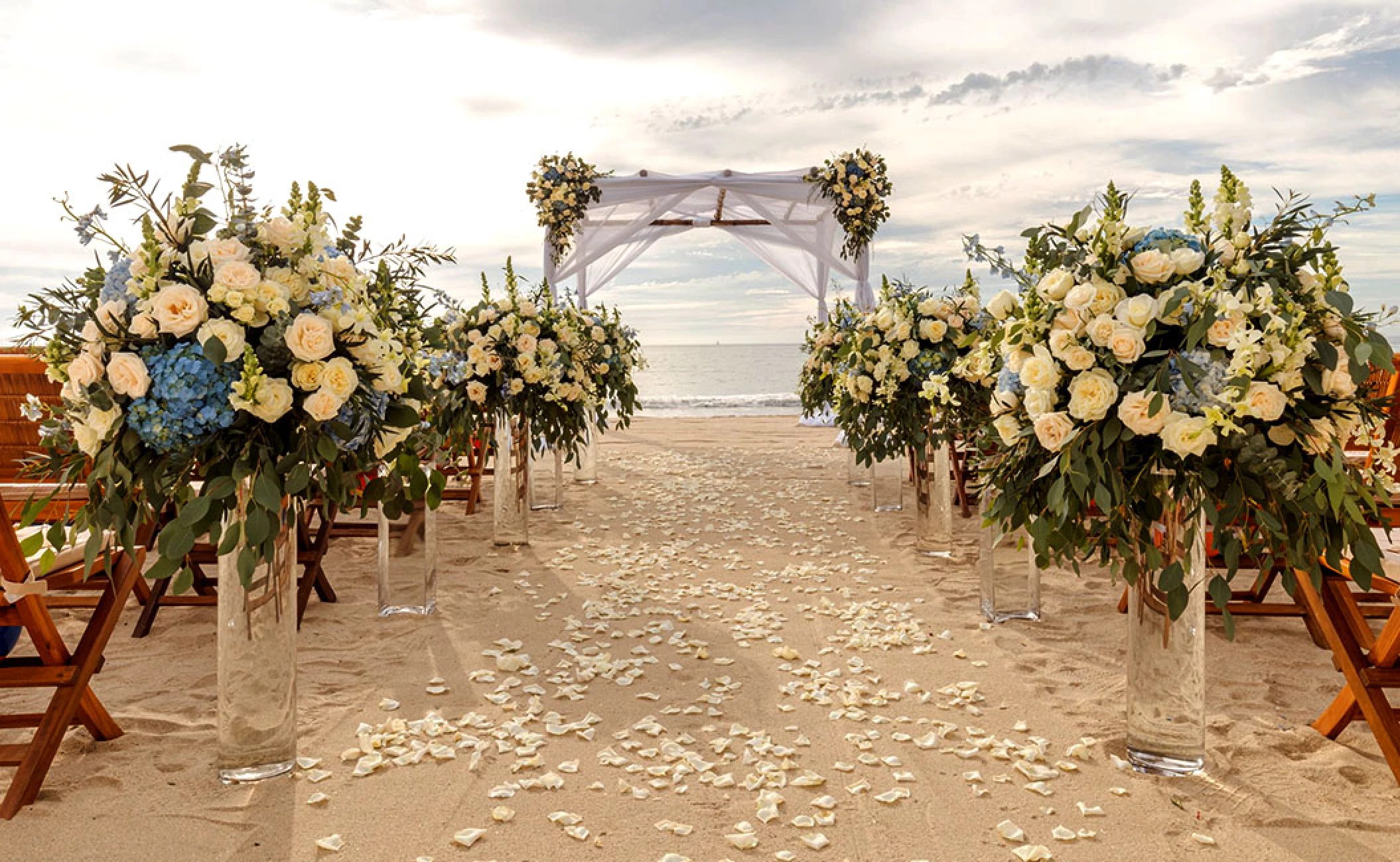 Beach wedding setup at Grand Velas Riviera Nayarit.