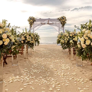 Beach wedding setup at Grand Velas Riviera Nayarit.