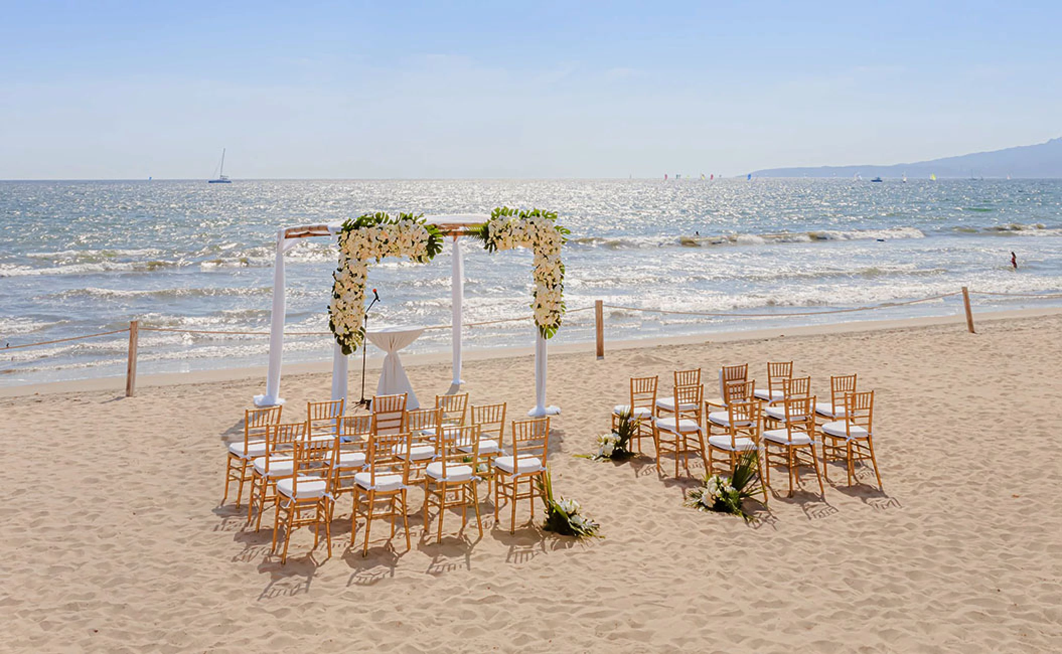 Beach wedding setup at Grand Velas Riviera Nayarit.