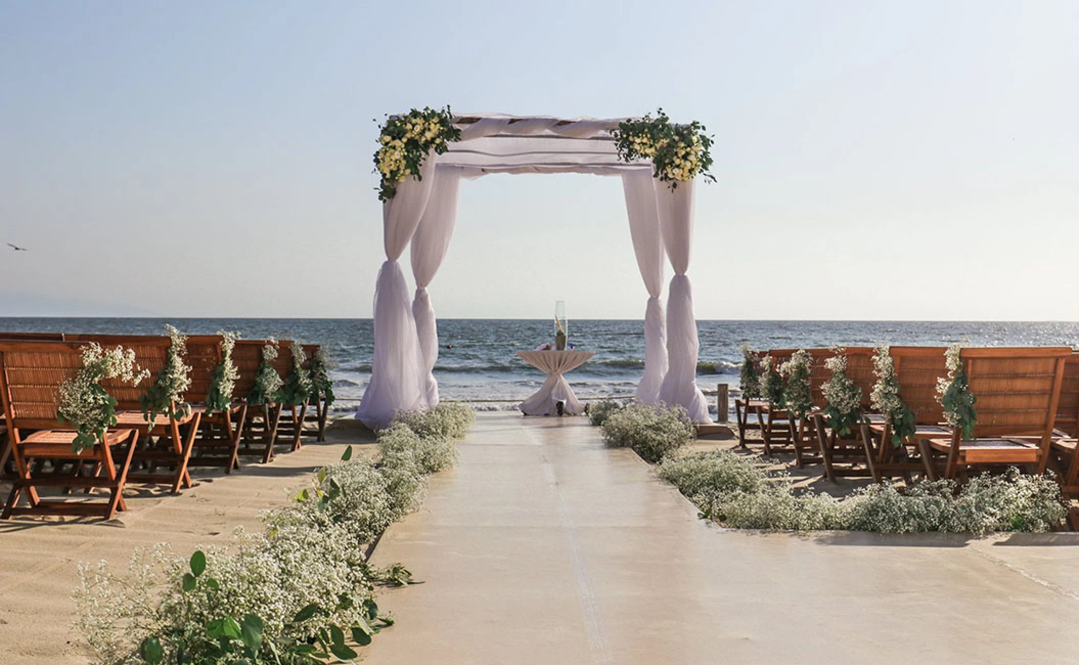 Beach wedding setup at Grand Velas Riviera Nayarit.