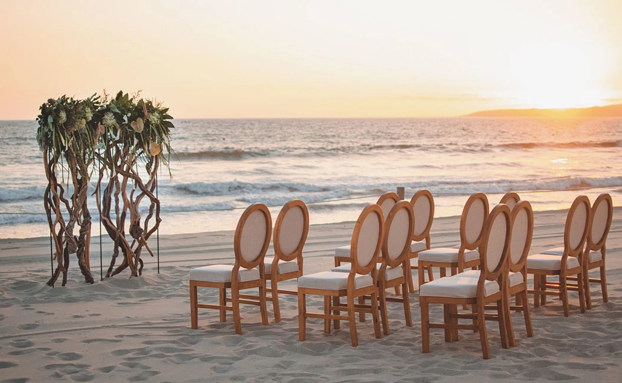 Beach wedding setup at Grand Velas Riviera Nayarit.