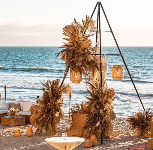 Beach wedding setup at Grand Velas Riviera Nayarit.