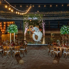 bride and groom at their reception on the beach at Ocean Maya Royale