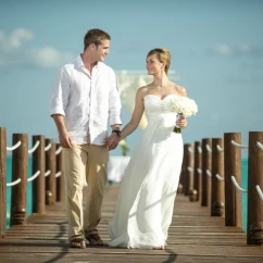 bride and groom on the pier venue at Ocean Maya Royale