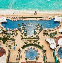 Drone shot of beach and pool of Hard Rock Cancun