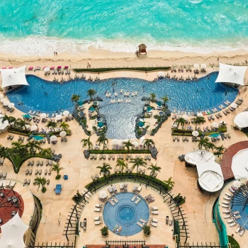 Drone shot of beach and pool of Hard Rock Cancun