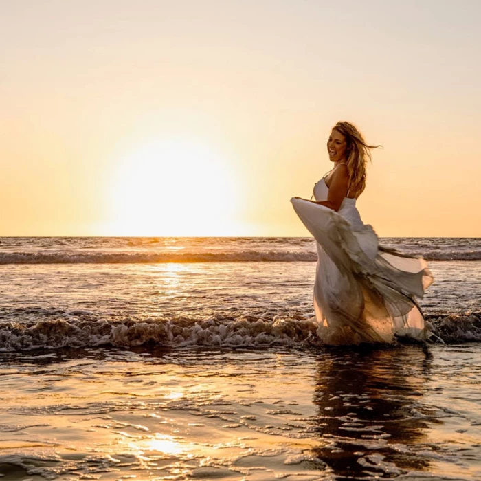 Bride at Sunset beach Wedding Venue at Hard Rock Hotel Vallarta.