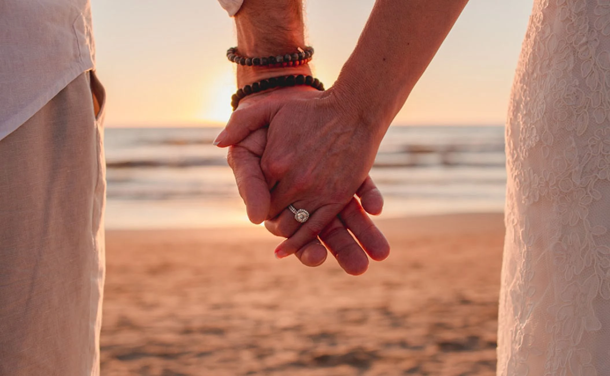 Couple at Sunset beach Wedding Venue at Hard Rock Hotel Vallarta.