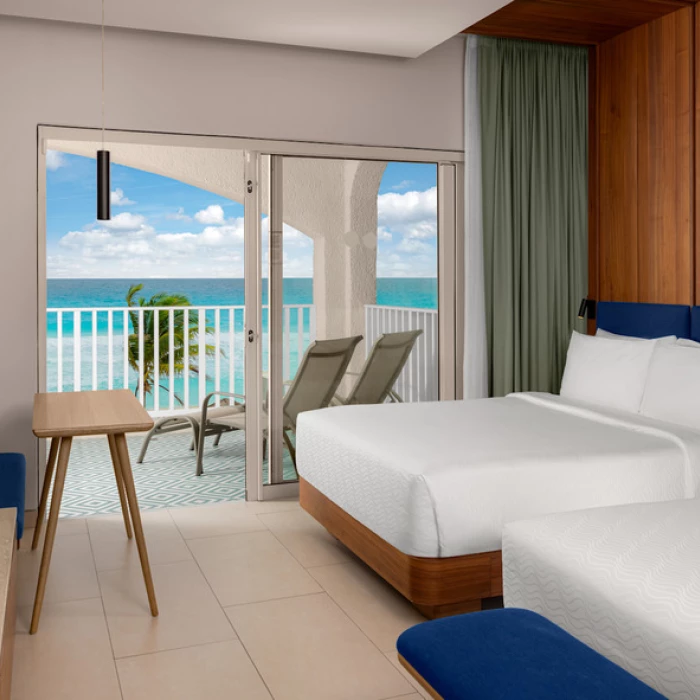 suite with two double beds at Hilton Cancun Mar Caribe