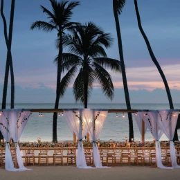 beach area venue with reception setup at Hilton La Romana